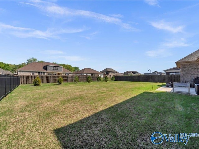414 Wood Sage Ln, Huntsville, AL 35824 - view of yard featuring a patio area and a fenced backyard