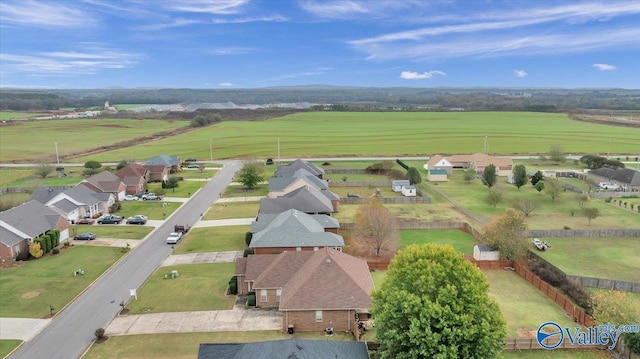 birds eye view of property featuring a rural view