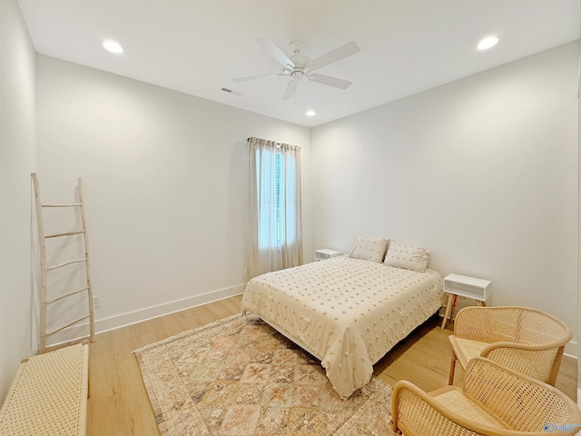 bedroom featuring wood-type flooring and ceiling fan