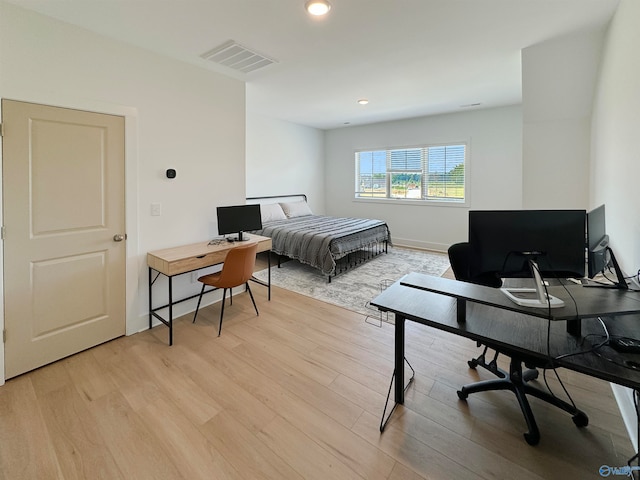 bedroom featuring light wood-type flooring