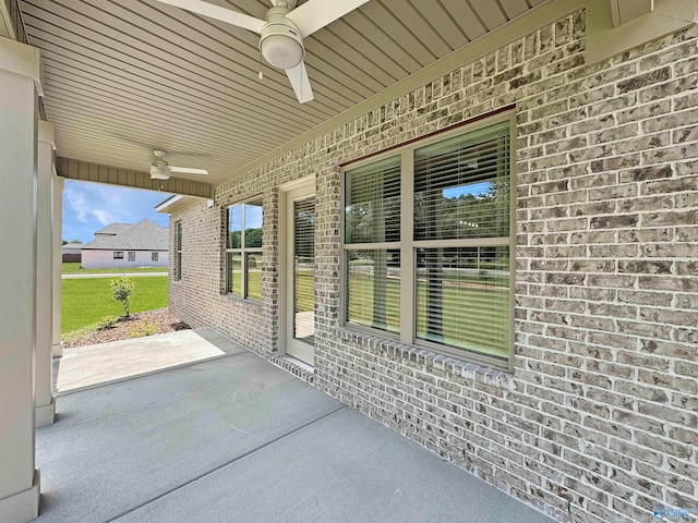 view of patio featuring ceiling fan