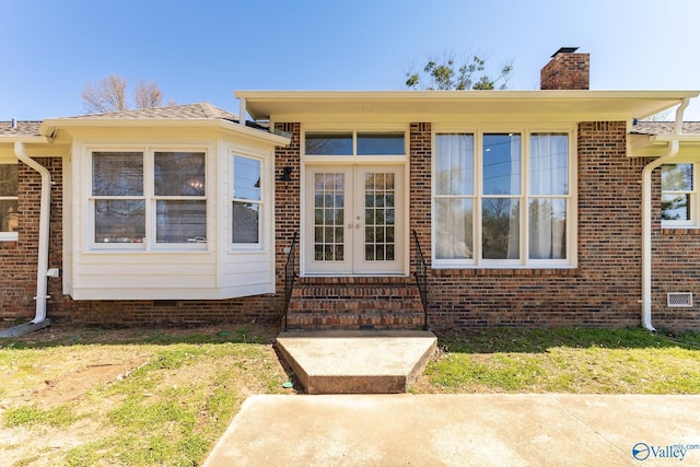 doorway to property with french doors