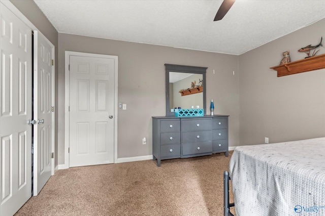 bedroom featuring ceiling fan and carpet flooring