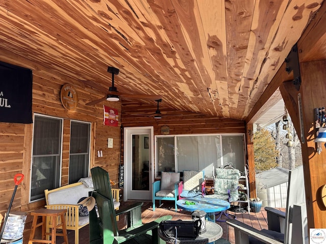 exterior space with a ceiling fan