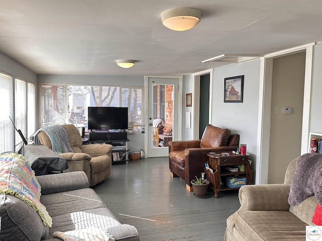 living room featuring dark wood-style flooring