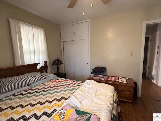 bedroom featuring a closet, a ceiling fan, and wood finished floors