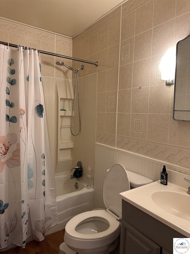 full bathroom with toilet, vanity, and shower / bath combination with curtain