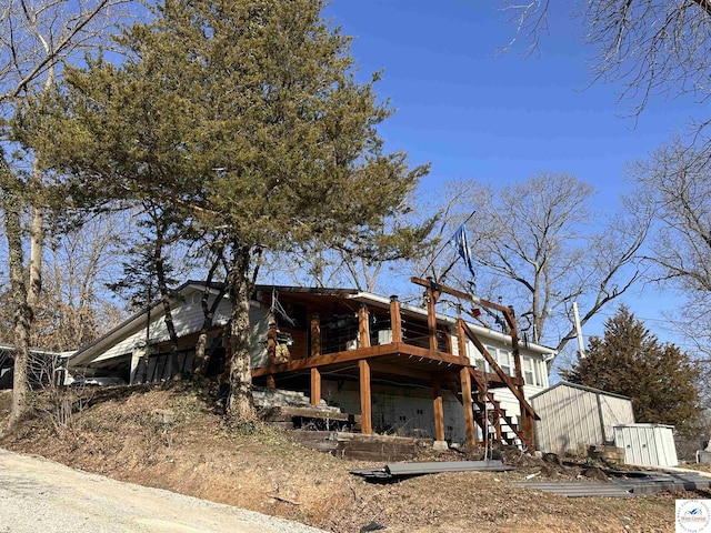 view of property exterior with stairs