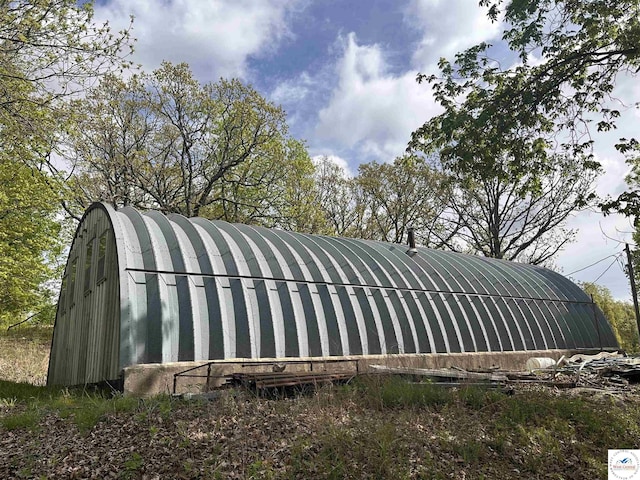 view of outbuilding featuring an outdoor structure