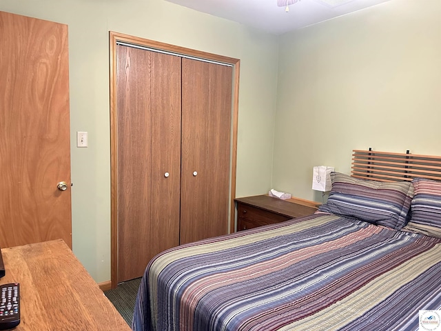 bedroom with a closet and carpet floors