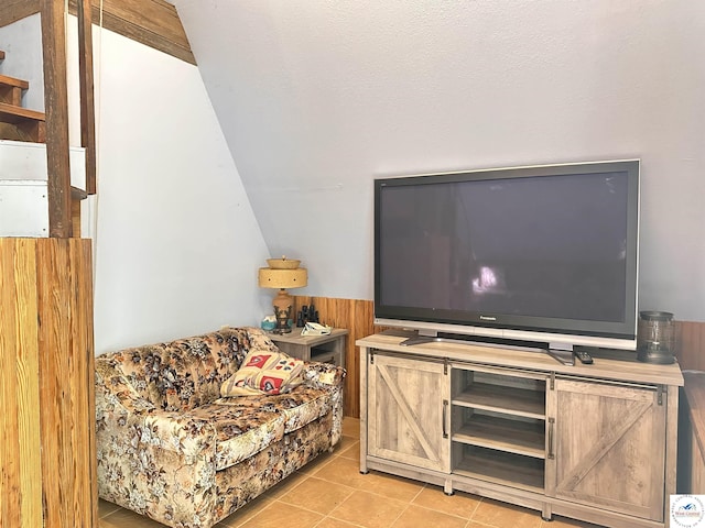 living area with tile patterned flooring