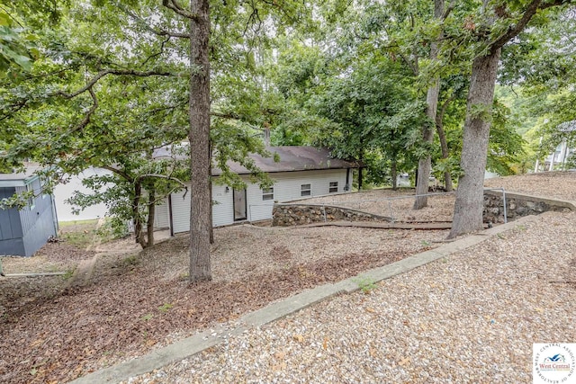 view of front of home with an outbuilding