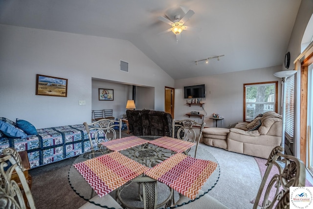 bedroom featuring lofted ceiling, carpet flooring, a ceiling fan, and visible vents