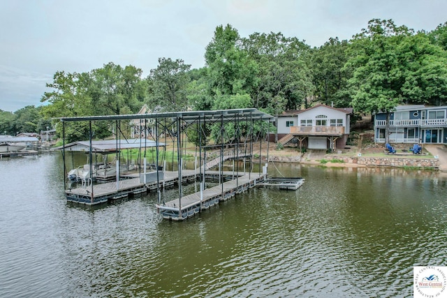 dock area with a water view