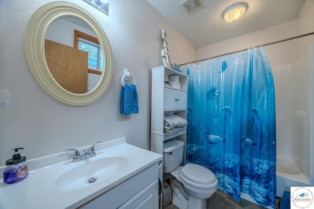 bathroom with visible vents, toilet, shower / bath combination with curtain, tile patterned flooring, and vanity