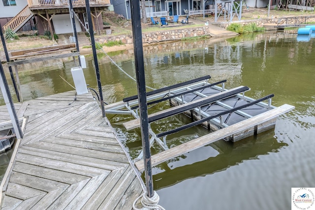 view of dock featuring a water view