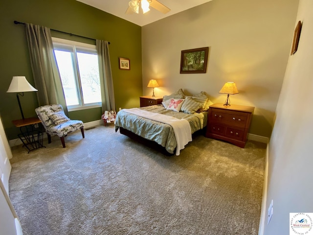 carpeted bedroom featuring ceiling fan, lofted ceiling, and baseboards