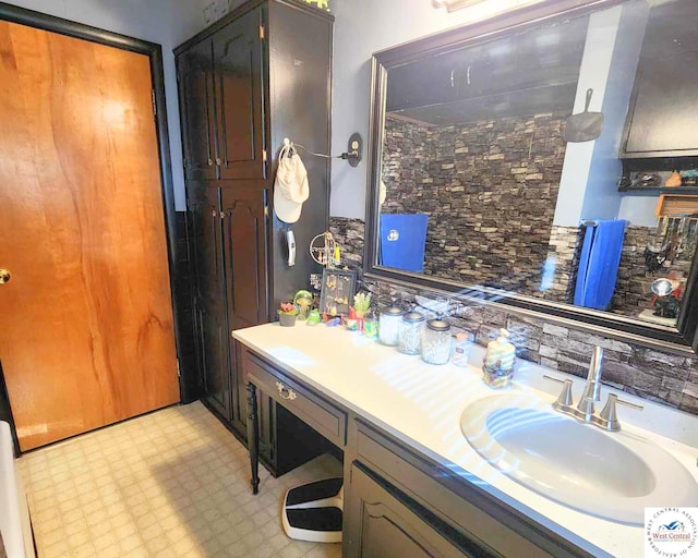 bathroom with vanity and tile patterned floors