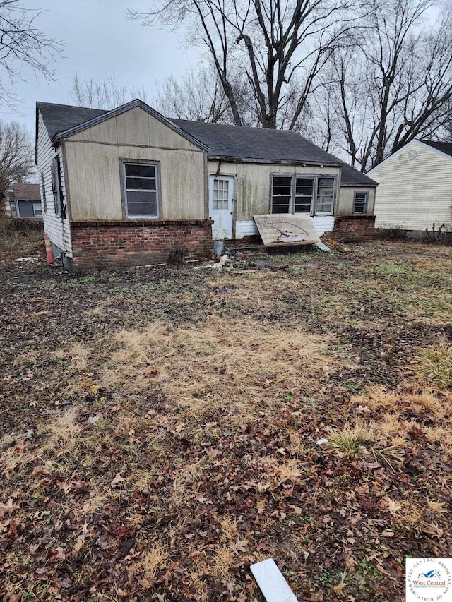 view of front of house with brick siding