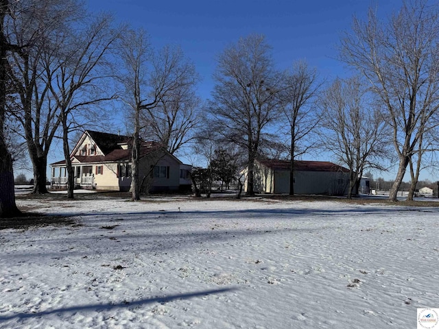 view of yard covered in snow