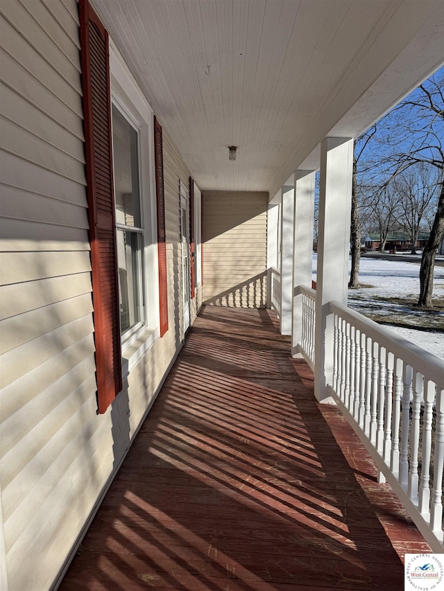 view of snow covered deck