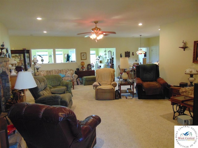 carpeted living room featuring recessed lighting and ceiling fan