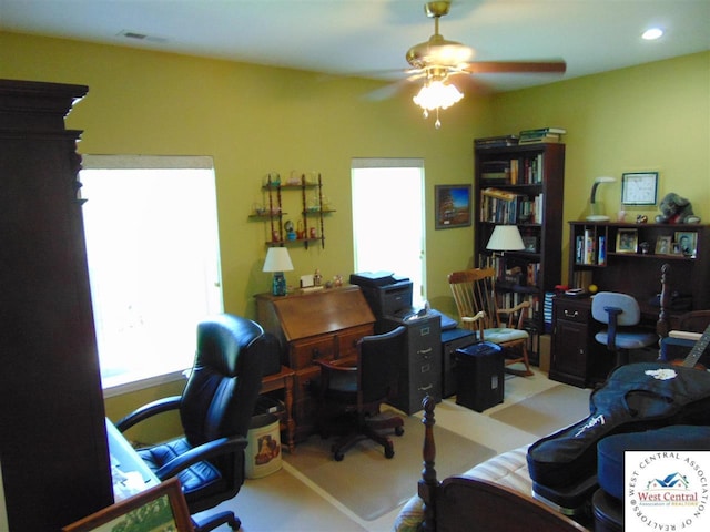 office featuring recessed lighting, visible vents, and ceiling fan