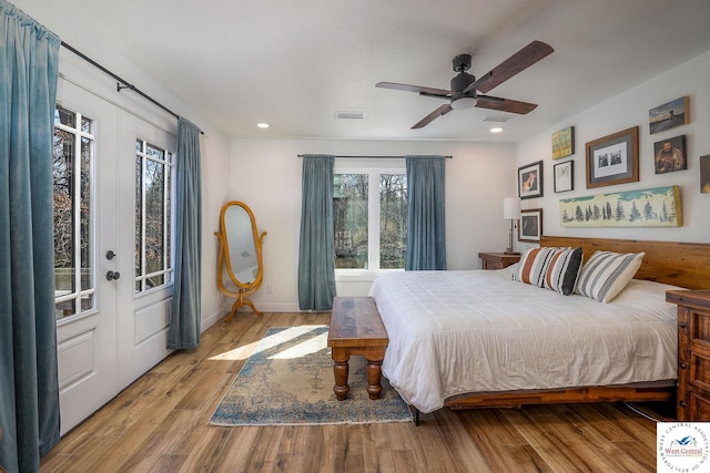 bedroom featuring recessed lighting, visible vents, wood finished floors, and ceiling fan