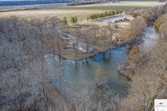 drone / aerial view with a water view and a rural view