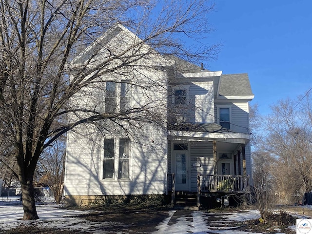 view of front of home featuring a shingled roof