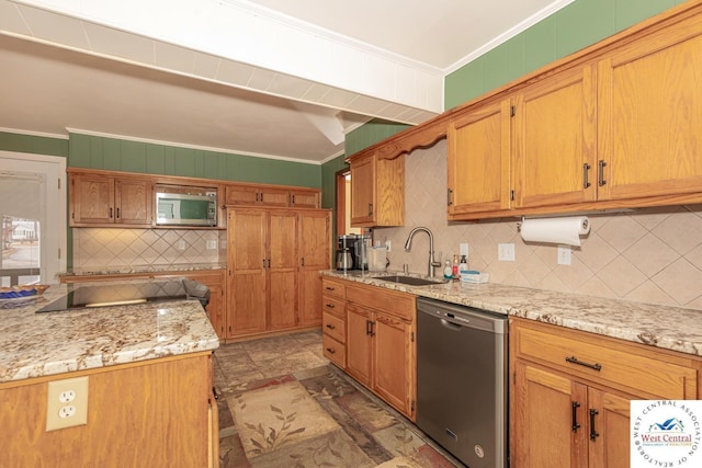 kitchen featuring light stone counters, a sink, decorative backsplash, ornamental molding, and stainless steel appliances