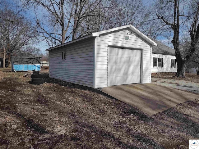 garage with driveway