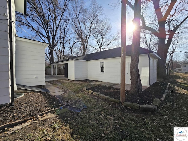 exterior space featuring a carport