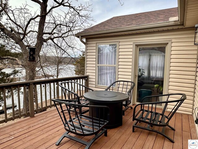 view of snow covered deck