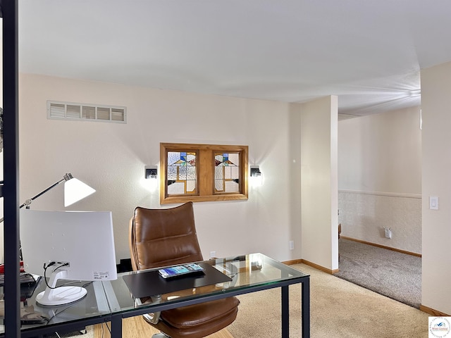 home office featuring baseboards, visible vents, and carpet flooring