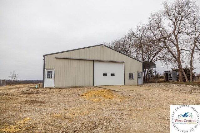 exterior space with dirt driveway