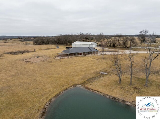 bird's eye view featuring a water view and a rural view