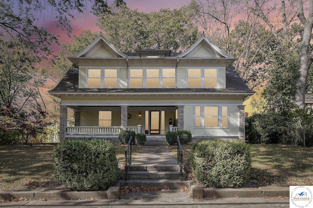 view of front of house with covered porch