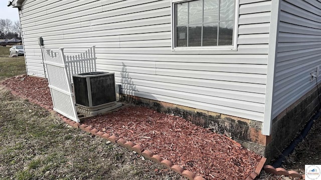 view of home's exterior with central air condition unit