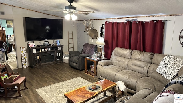 living area with a ceiling fan, wood finished floors, visible vents, lofted ceiling, and a textured ceiling