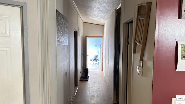 hallway featuring a textured ceiling