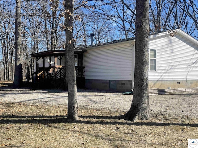 exterior space with crawl space