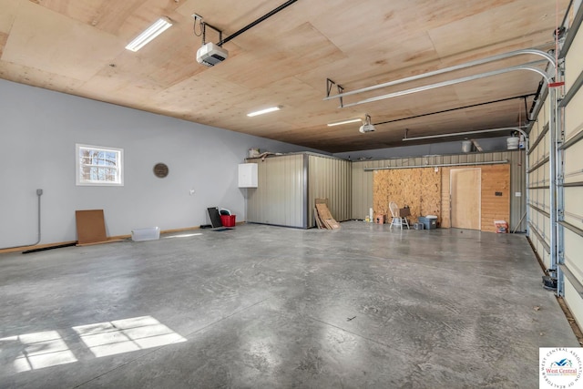 garage featuring a garage door opener