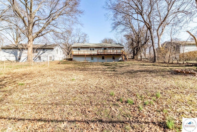 back of property with a deck