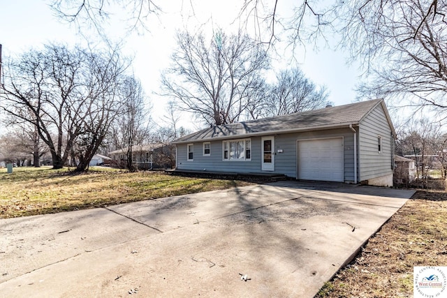 single story home with a garage and driveway