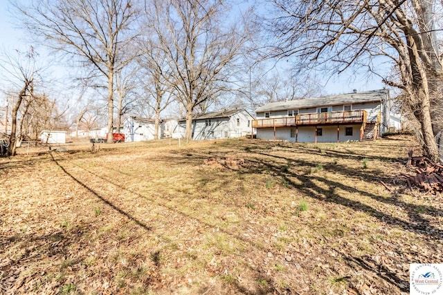 view of yard with a deck