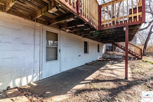 view of patio featuring stairway