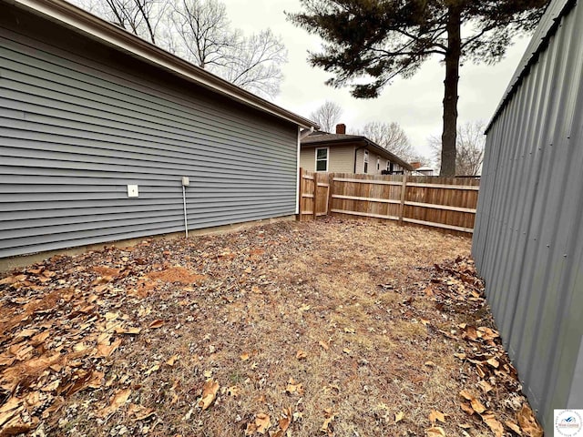 view of yard with fence