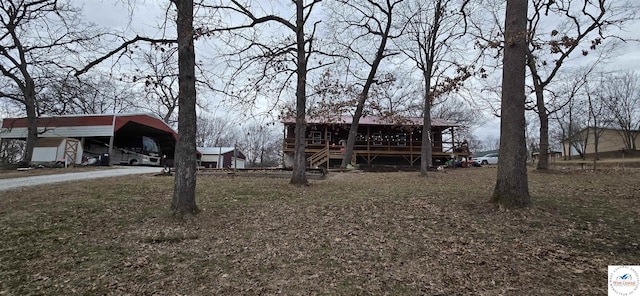 view of yard with a carport