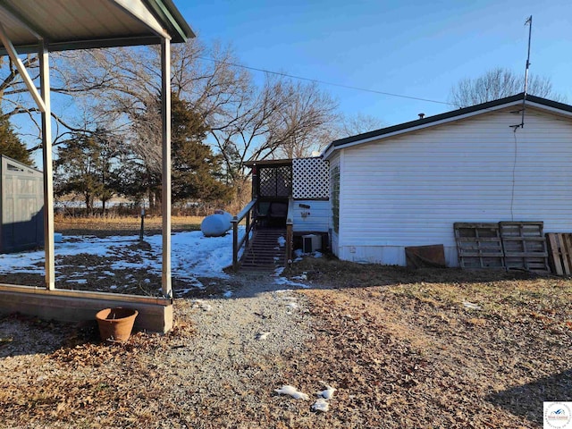 view of yard featuring central AC